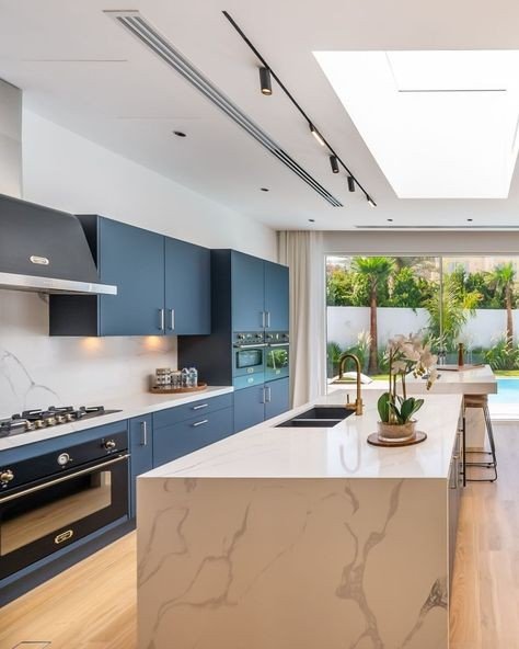 Elegant kitchen renovation with modern lighting in Dubai